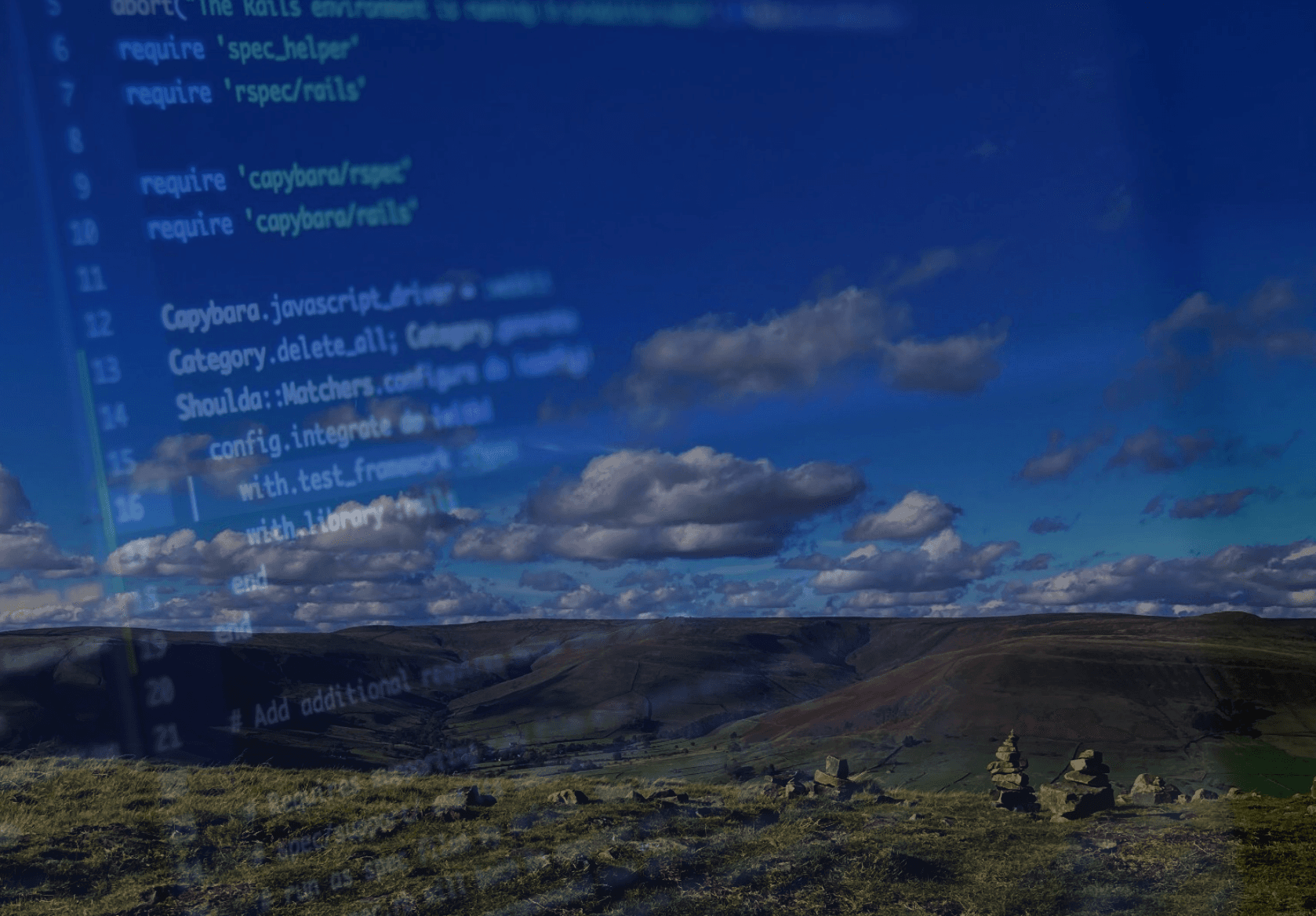 Scenic countryside hill view with clouds and computer code overlayed transparently